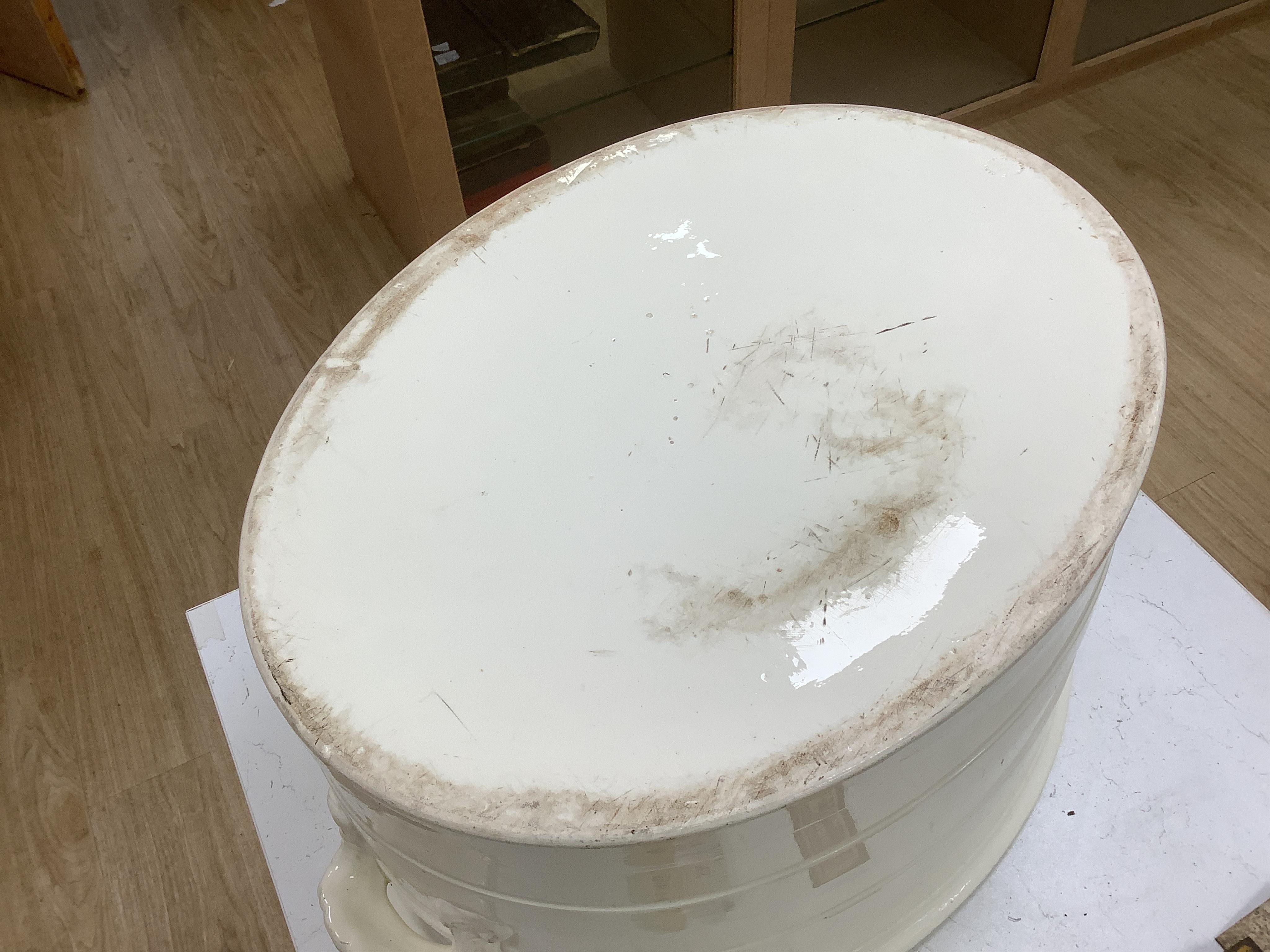 A Victorian Copeland & Garrett 'New Fayence' oval two handled footbath, 56cm wide, 26cm high. Condition - fair